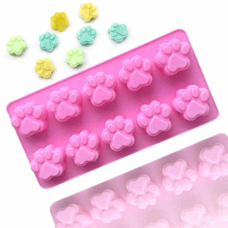 Moule en silicone rose forme patte d’animal pour friandises glacées, chocolats et décorations de gâteaux, flexible et antiadhésif, qualité alimentaire sans BPA.