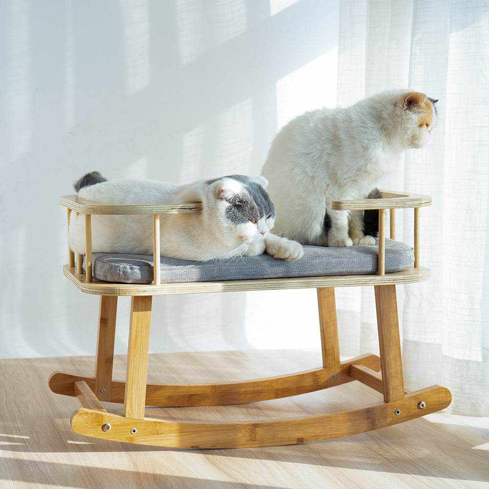 Comfortable INSTACHEW Rockaby pet bed with plush cushion for cats and dogs, made of durable bamboo wood.