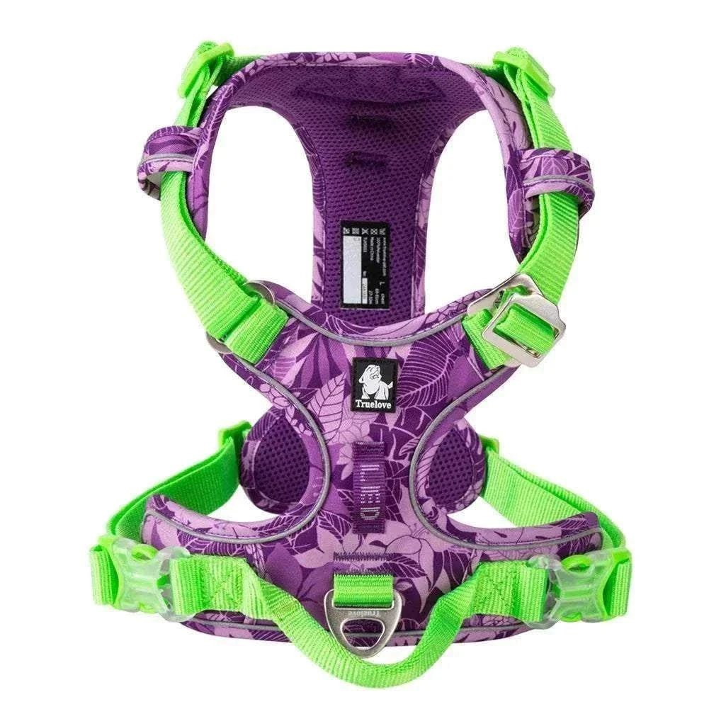 Harnais anti-traction pour chien TRUE LOVE en nylon violet et vert avec bandes réfléchissantes et poignée de contrôle.